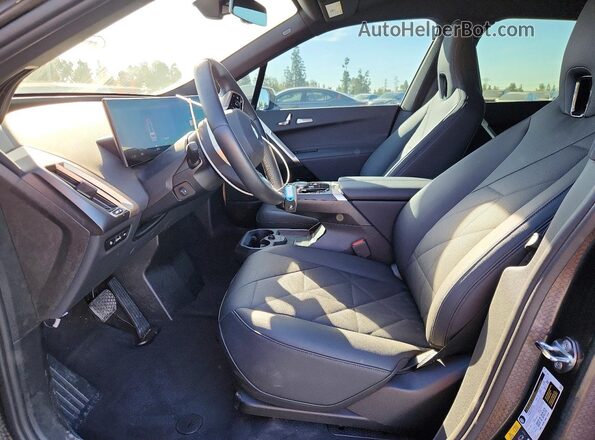 WB543CF04TCV02588 2026 BMW IX White Front interior view