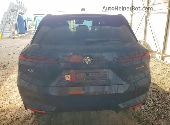 WB543CF04TCV95306 2026 BMW IX Синий Вид сзади