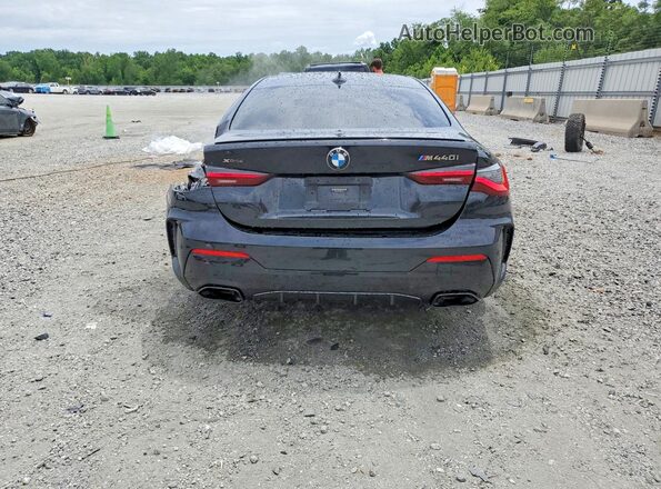 WBA13AR04MCF77185 2021 BMW M4 Charcoal Rear view