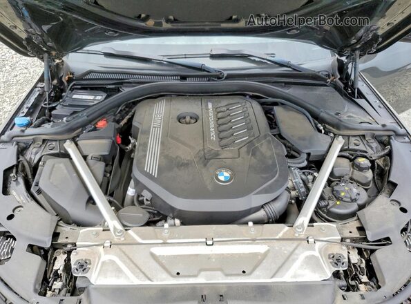 WBA13AR04MCF77185 2021 BMW M4 Charcoal Rear interior view