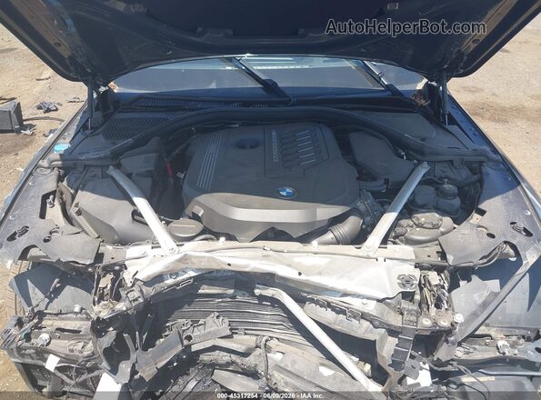 WBA13AR05MCG10694 2021 BMW M4 Gray Rear view