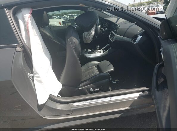 WBA13AR05MCG10694 2021 BMW M4 Gray Front interior view