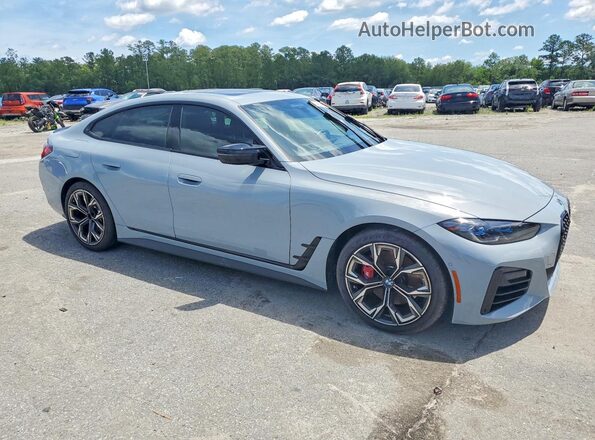WBA13AW04RFR22612 2024 BMW M4 Gray Przód prawy