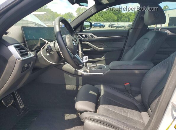 WBA13AW04RFR22612 2024 BMW M4 Gray Widok wnętrza z przodu