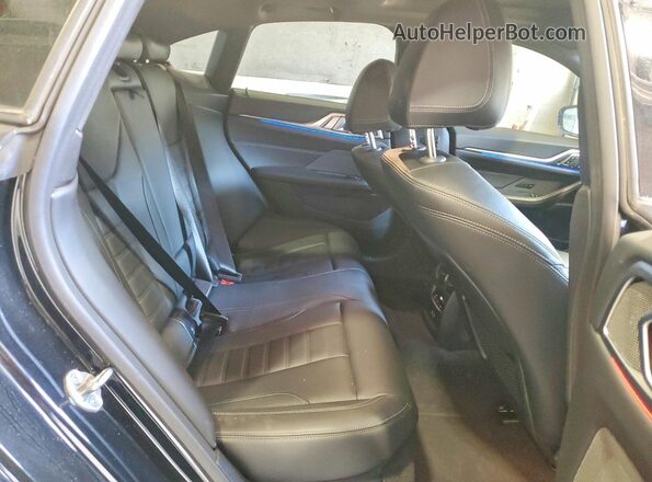 WBA13AW0XNFL97596 2022 BMW M4 Black Հետևի նստատեղերի տեսք