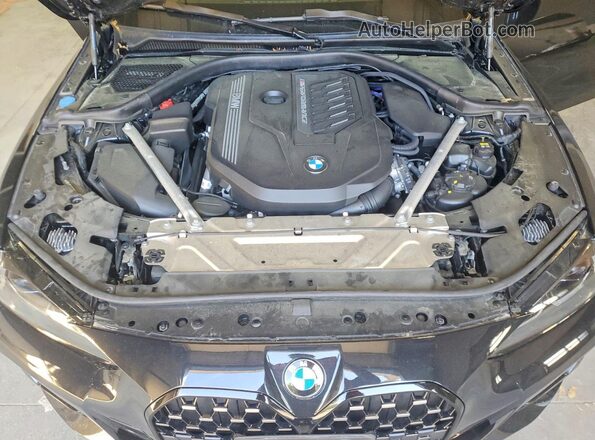 WBA13AW0XNFL97596 2022 BMW M4 Black Սալոնի հետևի տեսք