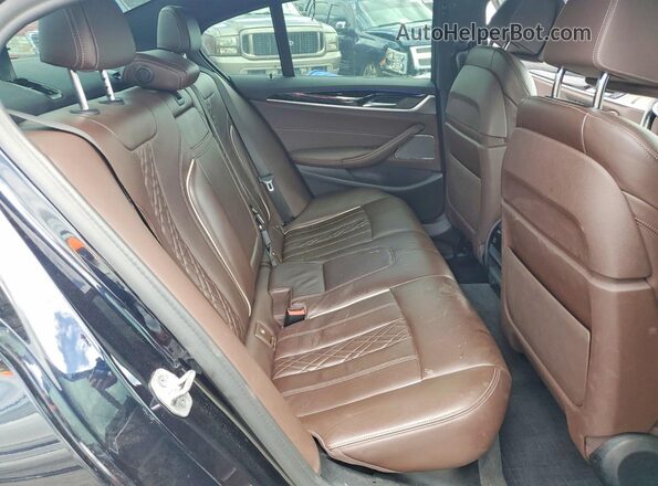 WBA13BK03MCG09740 2021 BMW M5 Blue Vista de los asientos traseros
