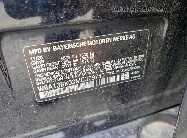 WBA13BK03MCG09740 2021 BMW M5 Blue Vista del compartimento del motor