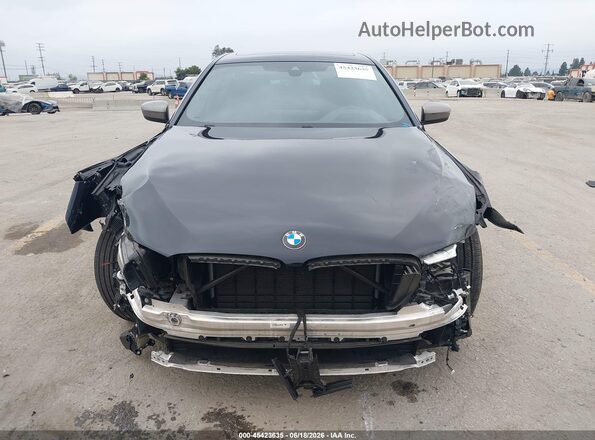 WBA13BK03NCL06813 2022 BMW M5 Dark Blue Widok wnętrza z tyłu