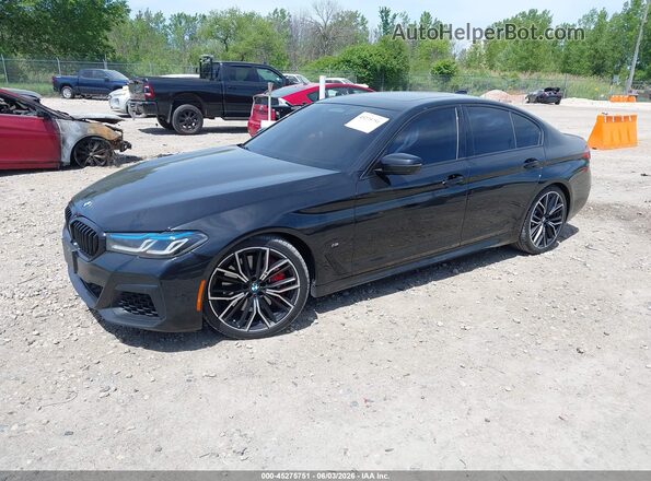 WBA13BK09NCK21703 2022 BMW M5 Black წინა მარცხენა ხედი სამი მეოთხედიდან