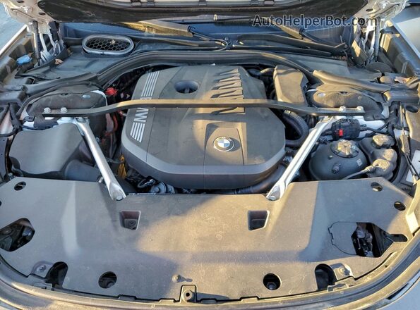 WBA23EH03PCM28457 2023 BMW 7 SERIES Gray Vista interior trasera