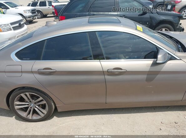 WBA4A9C56GG508613 2016 BMW 4 SERIES Brown Widok wnętrza z tyłu