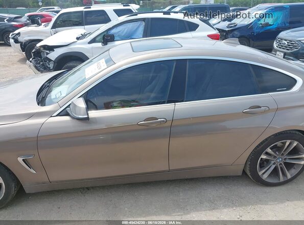 WBA4A9C56GG508613 2016 BMW 4 SERIES Brown Widok wnętrza 360 stopni