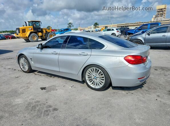 WBA4A9C58GG506474 2016 BMW OTHER Silver 