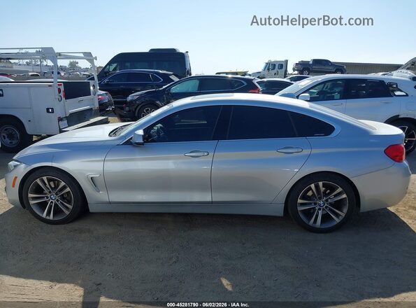 WBA4A9C5XGG505309 2016 BMW 7 SERIES Silver Widok wnętrza z tyłu