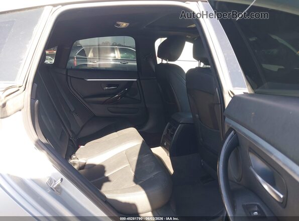 WBA4A9C5XGG505309 2016 BMW 7 SERIES Silver Widok naklejki z numerem VIN