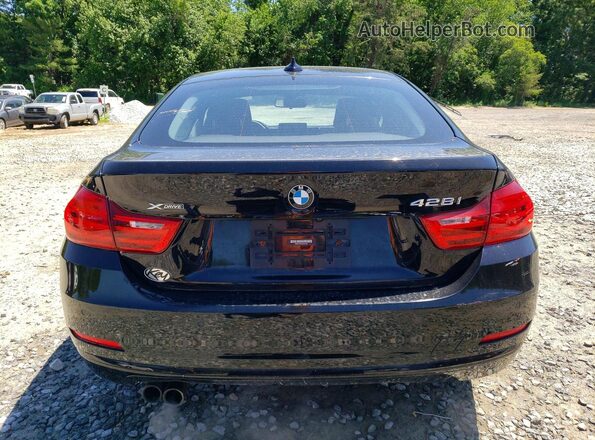 WBA4C9C58GG137657 2016 BMW 4 SERIES Black Rear view