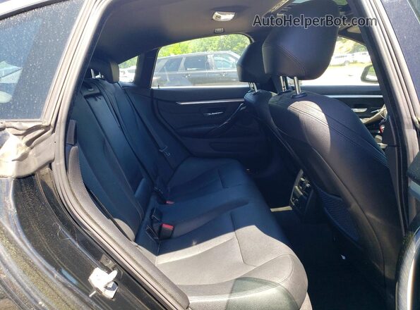 WBA4C9C58GG137657 2016 BMW 4 SERIES Black Rear seats view