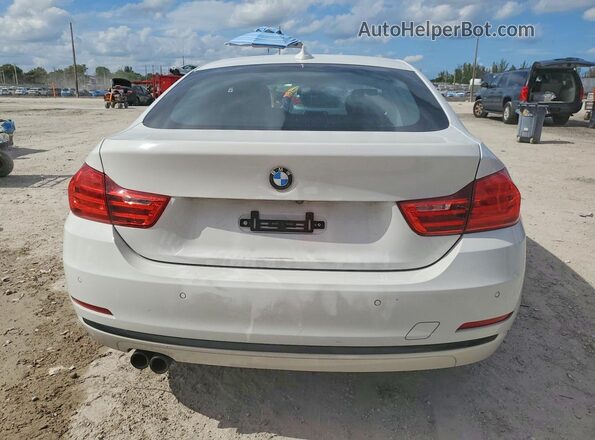 WBA4C9C59GG137151 2016 BMW 4 SERIES White Widok z tyłu