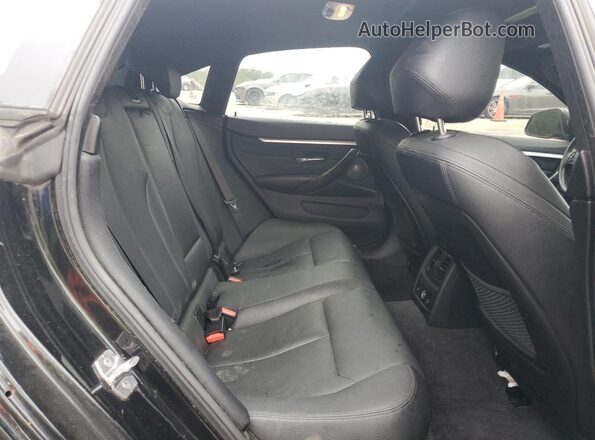 WBA4F7C53HG786912 2017 BMW 4 SERIES Black Rear seats view