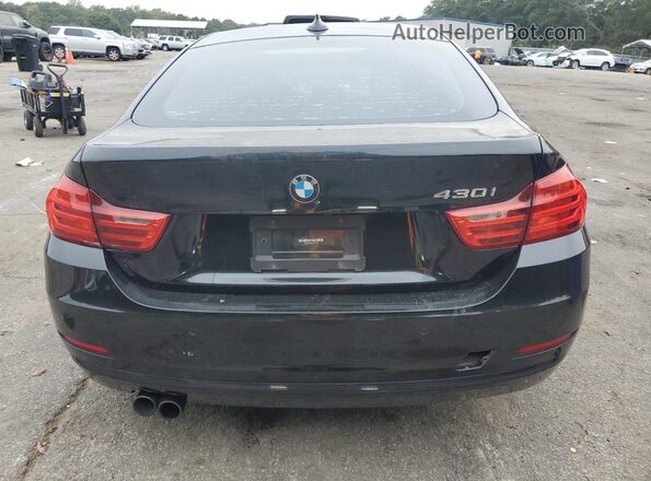 WBA4F7C53HG786912 2017 BMW 4 SERIES Black Rear view