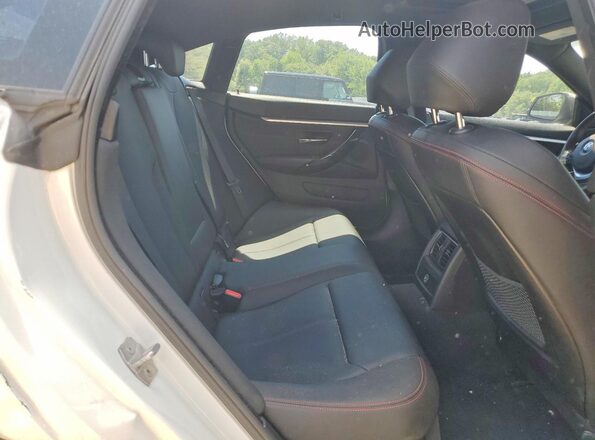 WBA4F9C32HG812233 2017 BMW 4 SERIES White Vista de los asientos traseros