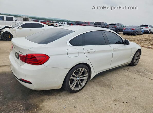 WBA4J1C52JBG79657 2018 BMW OTHER White Trasero derecho