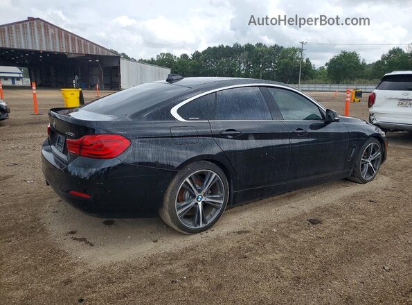 WBA4J1C55JBA30080 2018 BMW OTHER Black 
