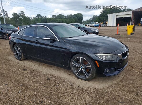 WBA4J1C55JBA30080 2018 BMW OTHER Black 