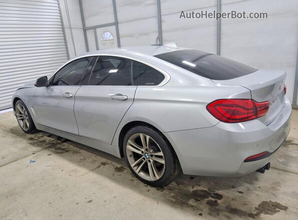 WBA4J1C55KBM14892 2019 BMW 4 SERIES Silver Trasero izquierdo