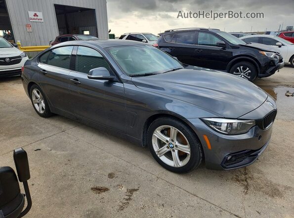 WBA4J1C56JBM09960 2018 BMW 4 SERIES Gray Front right