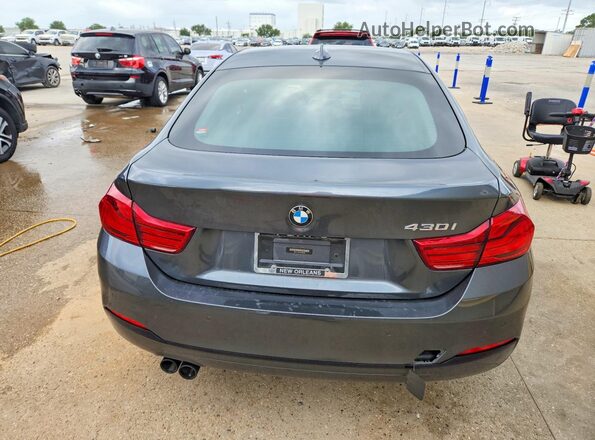 WBA4J1C56JBM09960 2018 BMW 4 SERIES Gray Rear view