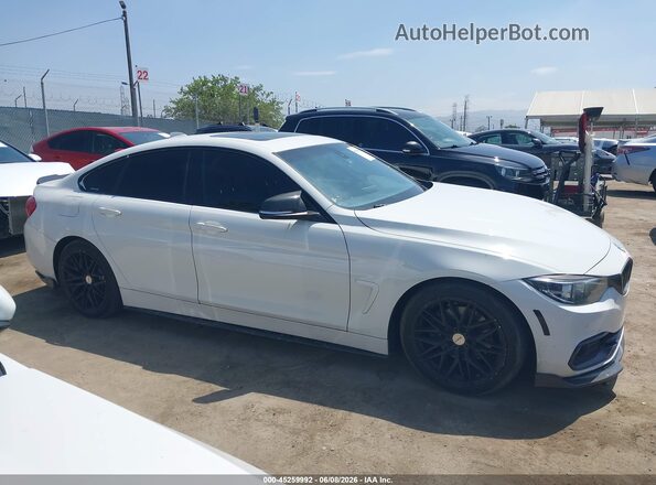 WBA4J1C59JBG80353 2018 BMW 4 SERIES White Vista interior trasera