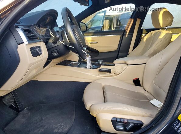 WBA4J3C50KBL10516 2019 BMW 4 SERIES Черный Вид салона спереди