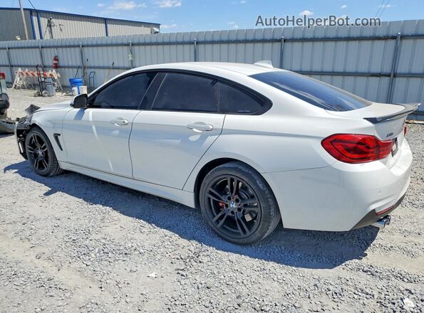 WBA4J3C53JBG90534 2018 BMW 7 SERIES White Tył lewy