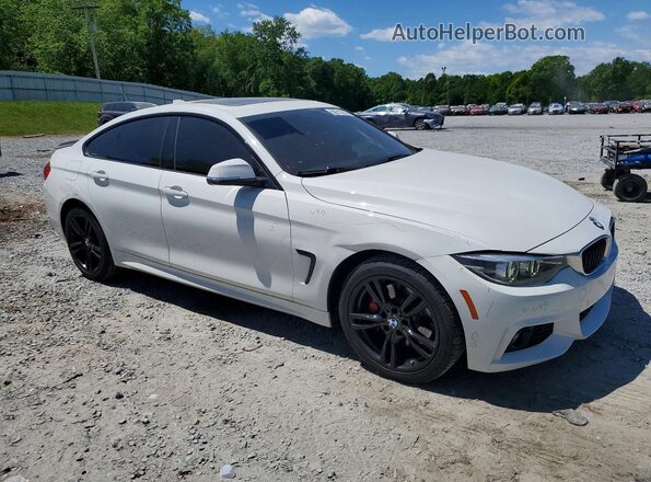 WBA4J3C53JBG90534 2018 BMW 7 SERIES White Przód prawy