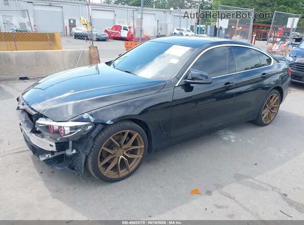 WBA4J3C58KBL09498 2019 BMW 4 SERIES Black Vista tres cuartos delantera izquierda