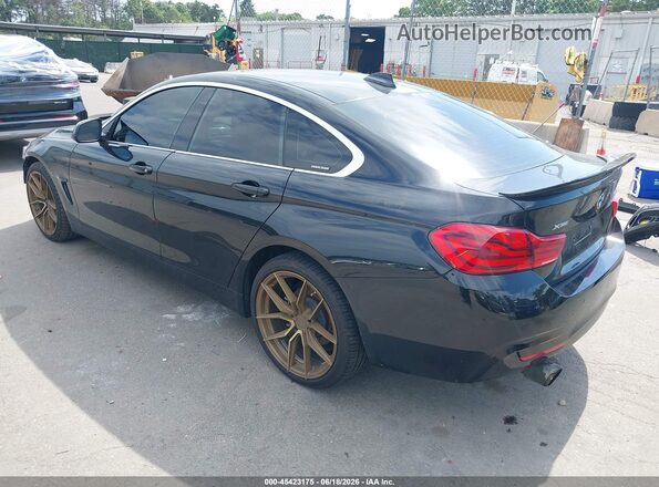 WBA4J3C58KBL09498 2019 BMW 4 SERIES Black Trasero izquierdo