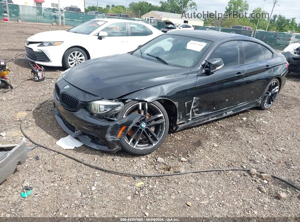 WBA4J5C52JBF07734 2018 BMW 4 SERIES Black Widok z przodu