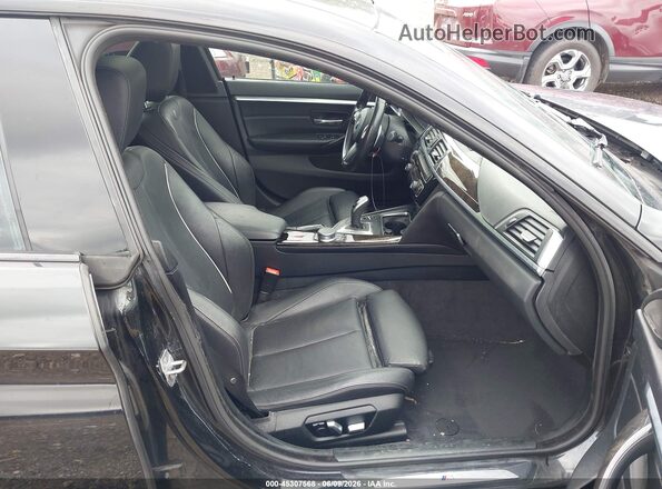 WBA4J5C52JBF07734 2018 BMW 4 SERIES Black Widok wnętrza z przodu