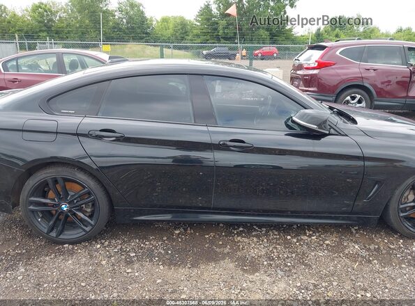 WBA4J5C52JBF07734 2018 BMW 4 SERIES Black Widok wnętrza z tyłu