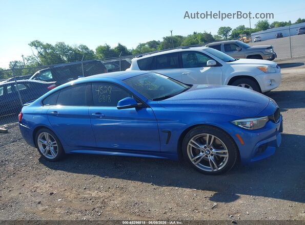 WBA4J5C53KBM65976 2019 BMW 4 SERIES Blue Vista interior trasera