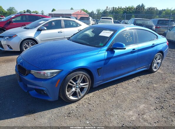 WBA4J5C53KBM65976 2019 BMW 4 SERIES Blue Vista tres cuartos delantera izquierda