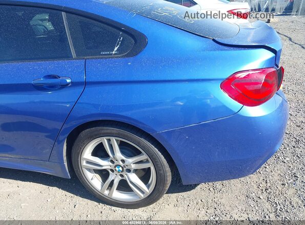 WBA4J5C53KBM65976 2019 BMW 4 SERIES Blue Vista frontal