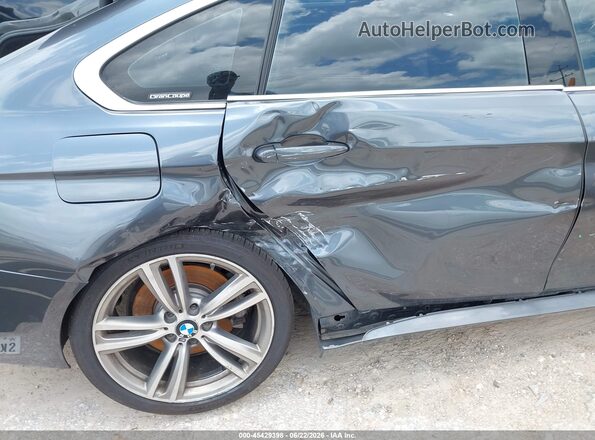 WBA4J5C58KBM65777 2019 BMW 4 SERIES Gray Вид спереду