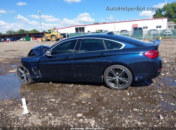 WBA4J7C52KBM75975 2019 BMW 4 SERIES Blue Widok wnętrza z tyłu