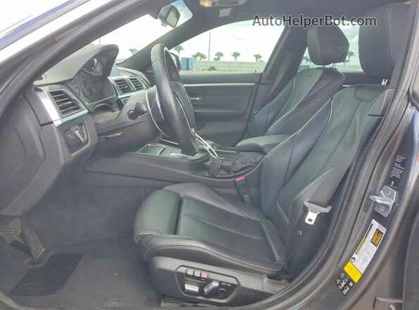 WBA4J7C55KBM75906 2019 BMW OTHER Gray Вид салону спереду