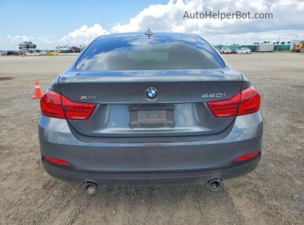 WBA4J7C55KBM75906 2019 BMW OTHER Gray Вид ззаду