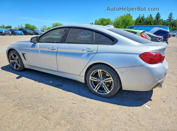 WBA4J7C58JBH14365 2018 BMW 4 SERIES Silver Հետևի ձախ