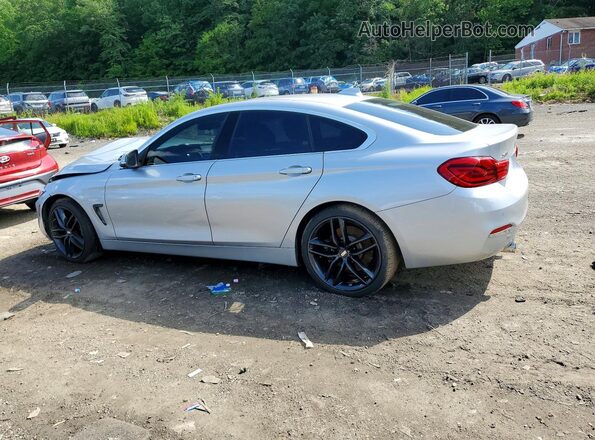 WBA4J7C5XJBH14836 2018 BMW OTHER Silver Rear left